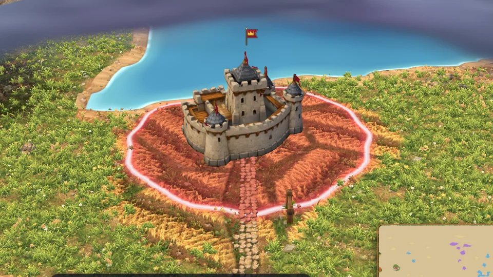 A stone fortress with a red banner inside a glowing red border, meadow and a lake around it